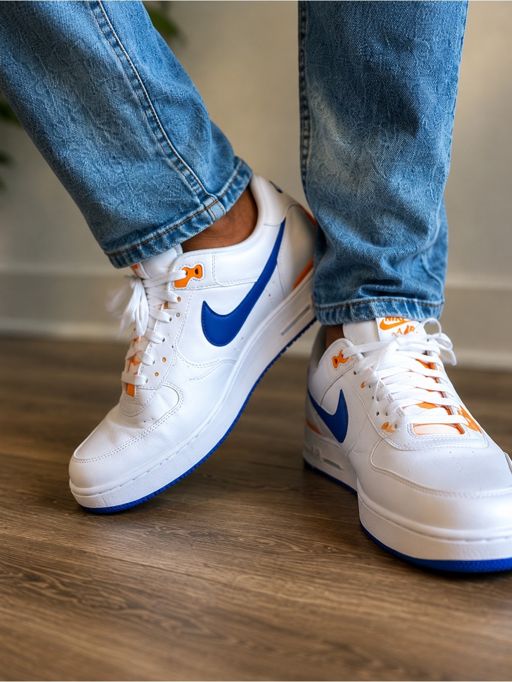 Nike Men's White Sneakers with Blue Swoosh & Orange Accents
